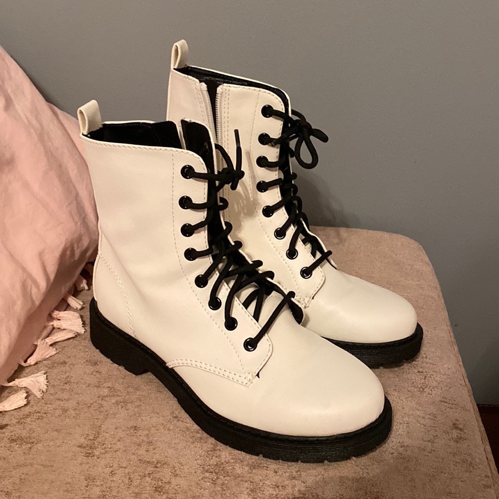 White and black combat boots